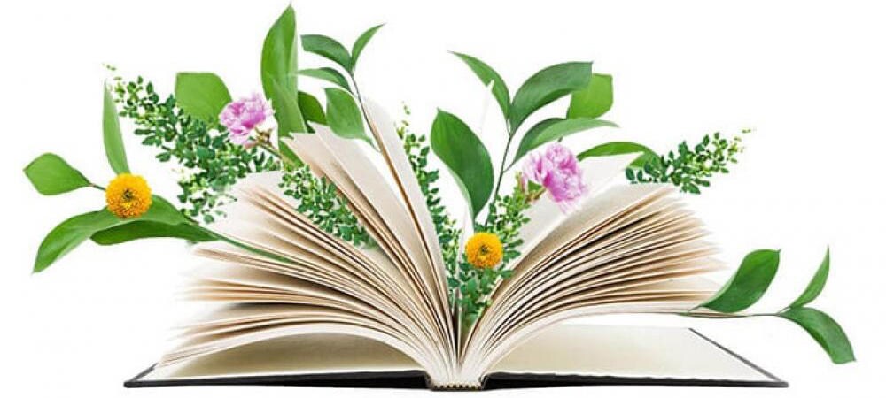 Отворена книга с венци с цветя